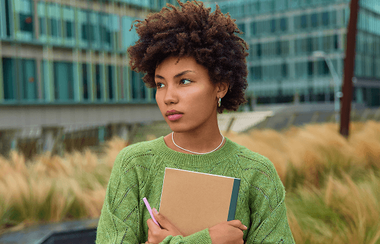 Student with notebook